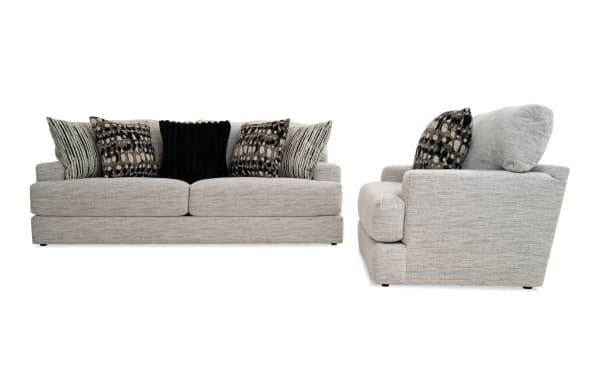 Glacier White 93'' transitional sofa and chair set with plush white polyester fabric, Bob-O-Pedic memory foam cushions, and six patterned accent pillows.