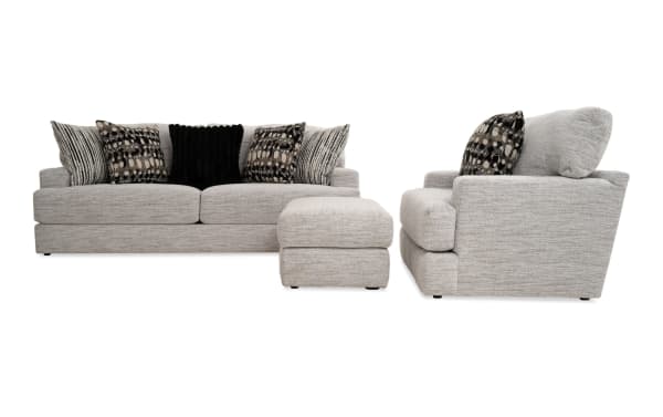 Glacier White 93'' transitional sofa, chair, and ottoman set with plush white polyester fabric, Bob-O-Pedic memory foam cushions, and six accent pillows.