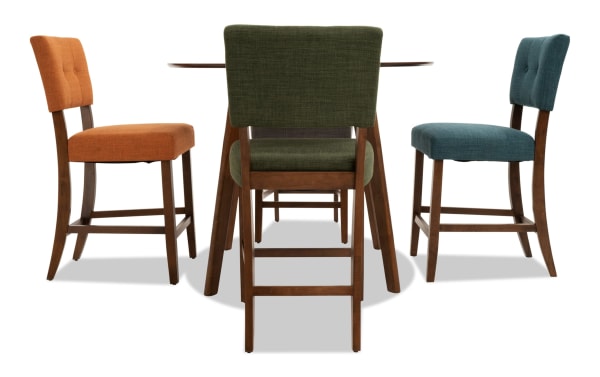 Bettie 5 Piece Walnut & Multicolor Upholstered Round Counter Height Dining Set with button-tufted green, russet, and teal polyester fabric seats, mid-century modern style, rubberwood and walnut veneer frame, flared legs, and Bob-O-Pedic Memory Foam cushions.