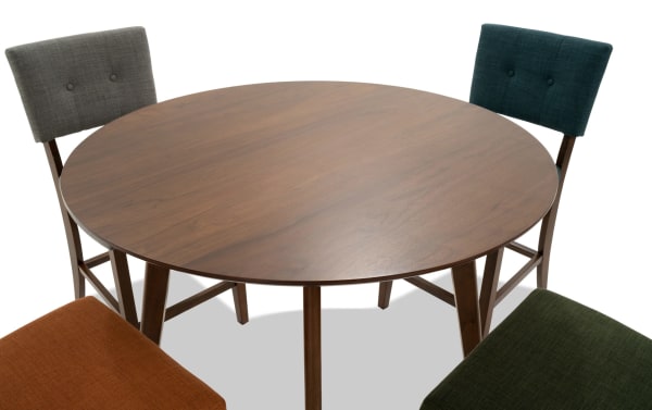 Bettie 5 Piece Walnut & Multicolor Upholstered Round Counter Height Dining Set with mid-century modern style, button-tufted fabric seats in gray, teal, russet, and green, featuring rubberwood solids and walnut veneer table.