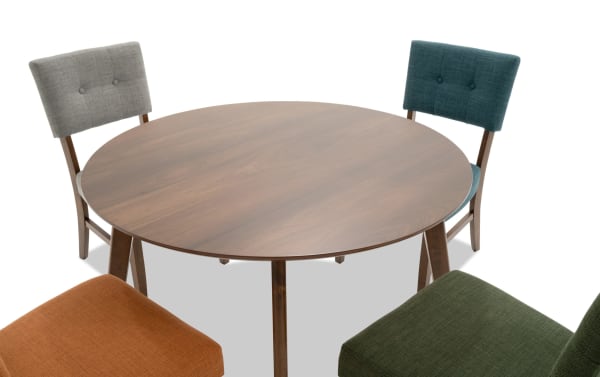 Bettie 5 Piece Mid-Century Modern Walnut & Multicolor Upholstered Round Dining Set with button-tufted polyester fabric chairs in gray, teal, russet, and green.