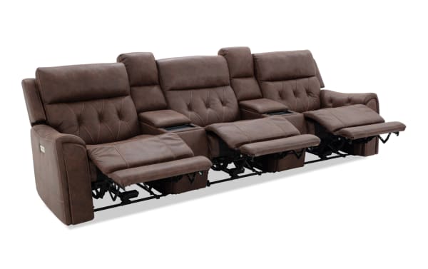 Brown leather three-seat reclining sofa with padded armrests, quilted back cushions, and built-in cup holders, ideal for home theater seating.