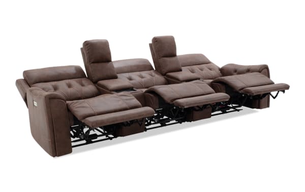 Brown leather reclining three-seat sofa with padded headrests, tufted cushions, and visible metal reclining mechanisms, designed for comfort and style.