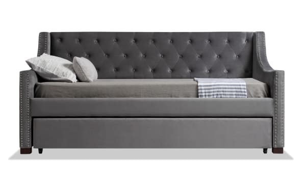 Chloe Twin Gray Upholstered Daybed with Twin Trundle in glam style, gray polyester fabric with tufted backrest and nailhead trim, includes 2 Bob-O-Pedic 6 mattresses.