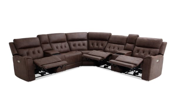 Brown leather sectional recliner sofa with tufted backrests, dual armrest cup holders, and visible reclining footrests, designed for living room comfort.
