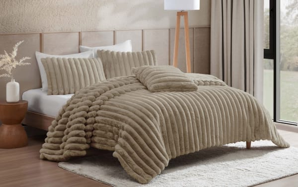 Sofia Full/Queen Taupe Solid Faux Fur 4-piece comforter set in soft taupe polyester fabric with textured, ribbed contemporary design for cozy, stylish bedding.