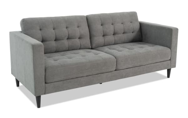 Metro Charcoal 78'' sofa in gray polyester fabric with tufted cushions, track arms, and tapered legs, featuring a transitional Metro collection design.