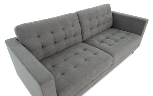 Metro Charcoal 78'' sofa with tufted charcoal gray polyester fabric upholstery, transitional style, and track arms from the Metro collection.