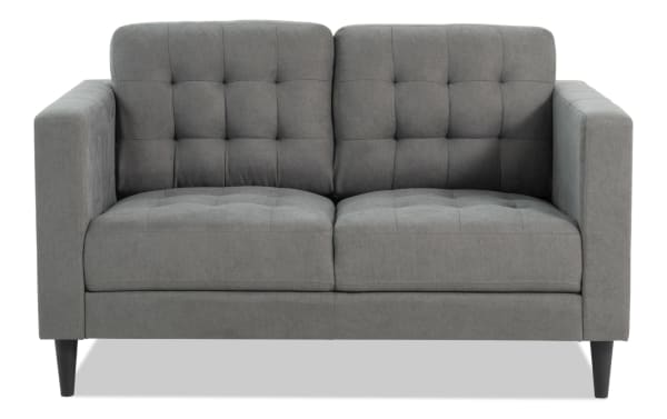 Metro Charcoal 57'' Loveseat in gray polyester fabric with tufted cushions, track arms, and tapered legs, featuring a transitional Metro collection design.