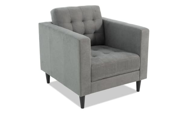 Metro Charcoal Chair in gray polyester fabric with tufted cushions, track arms, and tapered black legs, showcasing transitional style from the Metro collection.