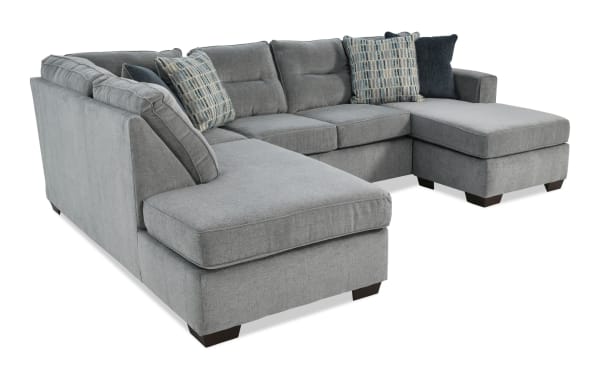 Dylan Slate 112'' 3 Piece Left Arm Facing Dual Chaise Sectional in gray polyester fabric with memory foam cushions, transitional style, and decorative pillows.
