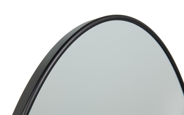 Luna Oval Black Wall Mirror with a sleek black metal frame, featuring a transitional style for subtle sophistication in home decor.