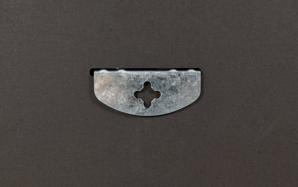Villa Arch Black Wall Mirror metal hanging bracket with cross-shaped keyhole slot for secure wall mounting in transitional style.