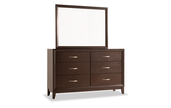 Transitional Tremont dresser in espresso finish with six drawers, MDF and rubberwood solids, featuring sleek metal handles and a matching framed mirror.