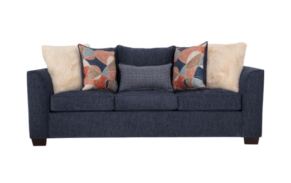 Brynn Navy 91'' transitional sleeper sofa in soft navy polyester fabric with Bob-O-Pedic memory foam cushions and colorful accent pillows.