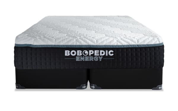 Energy 14'' King Firm Split Standard Mattress Set from Bob-O-Pedic Energy collection, featuring white quilted top, black side panels, gel-grid layer, memory foam with charcoal, and firm support with foundation.