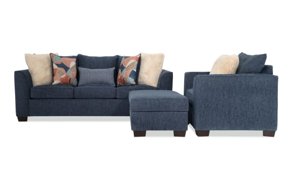 Brynn Navy 88'' transitional sleeper sofa set with polyester fabric upholstery, includes chair and storage ottoman, featuring gel memory foam mattress and assorted accent pillows.