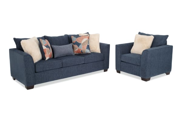 Brynn Navy 88" transitional sleeper sofa and chair set in soft navy polyester fabric with Bob-O-Pedic gel memory foam cushions and assorted accent pillows.