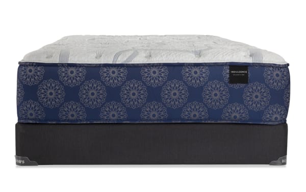 Indulgence 15" Twin XL Plush Standard Mattress Set with gel-infused foam, graphite Talalay latex, plush quilt, and foam-encased coil base in navy blue floral pattern and dark gray base.