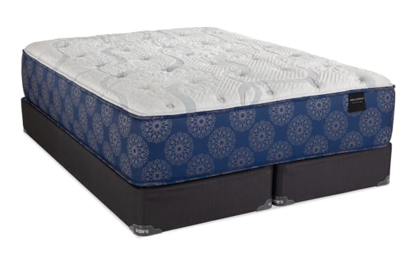 Indulgence 15'' King Plush Split Standard Mattress Set with blue floral-patterned sides, white quilted top, gel-infused foam, memory foam, and split black base by Bob's.