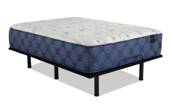 Power Bob Essential Base with Indulgence 15'' Twin XL Plush Mattress featuring a blue patterned side panel, white quilted top, adjustable black metal base with wired remote, and height-adjustable legs for customizable comfort and support.