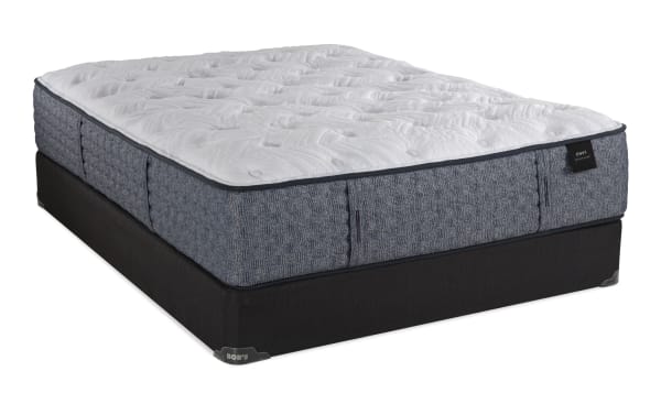 Envy 16'' Full Firm Standard Mattress Set with hand-tufted white Tencel knit cover, blue-gray hybrid comfort layers, and black foundation by Bob's.