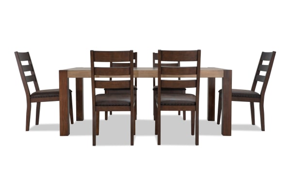 Rustic Canyon 7 Piece Brown Faux Leather Dining Set with multi-tone MDF wood table and cushioned chairs featuring Bob-O-Pedic memory foam upholstery.