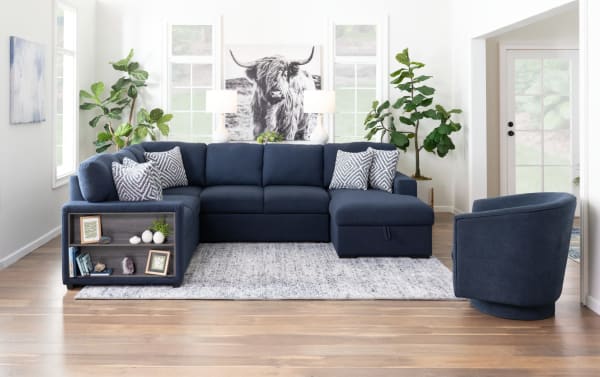 Playday Navy 119'' 4-piece right arm facing pop-up sleeper chaise sectional in navy polyester fabric with built-in bookshelf, storage chaise, USB/USB-C ports, and Bob-O-Pedic® memory foam cushions in transitional style.