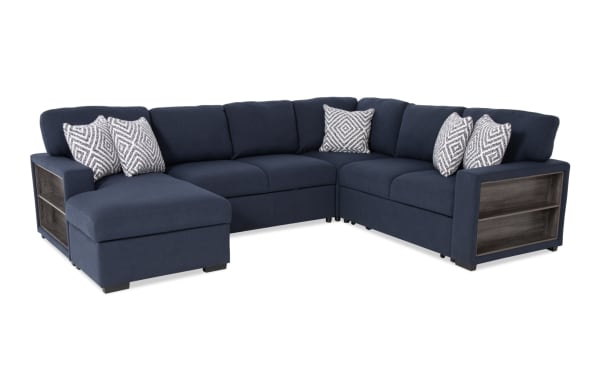 Playday Navy 119'' 4-piece left arm facing pop-up sleeper chaise sectional in navy polyester fabric with built-in bookshelf, accent pillows, and transitional style.