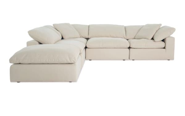 Beige Dream Shell 131'' 5 Piece Modular Sectional with oversized reversible cushions, fabric upholstery in polyester and nylon, transitional style.