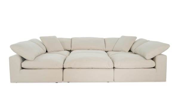 Beige Dream Shell 131'' 6 Piece Modular Sectional with oversized reversible cushions, 3 armless chairs, 2 corners, 1 ottoman in transitional style fabric upholstery.