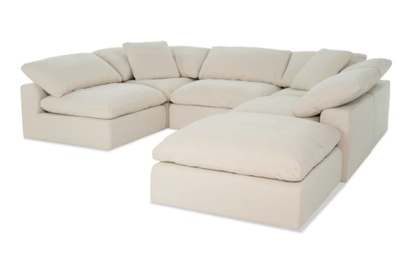 Beige Dream Shell 131'' 6 Piece Modular Sectional in transitional style with polyester fabric, featuring 3 armless chairs, 2 corners, and 1 ottoman.