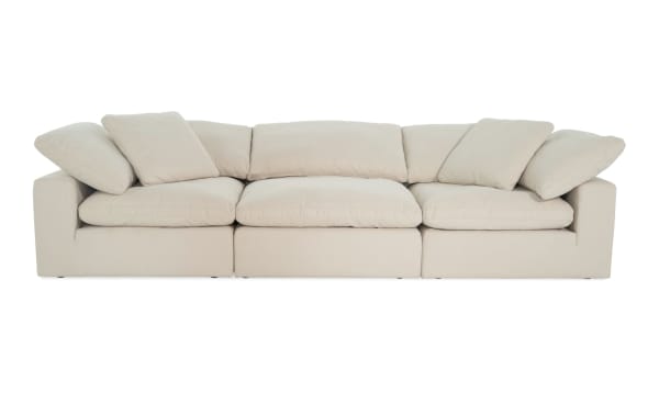Dream Shell 131'' beige 3-piece modular sofa with 2 corner seats, 1 armless chair, reversible oversized cushions, polyester-nylon fabric, transitional style.