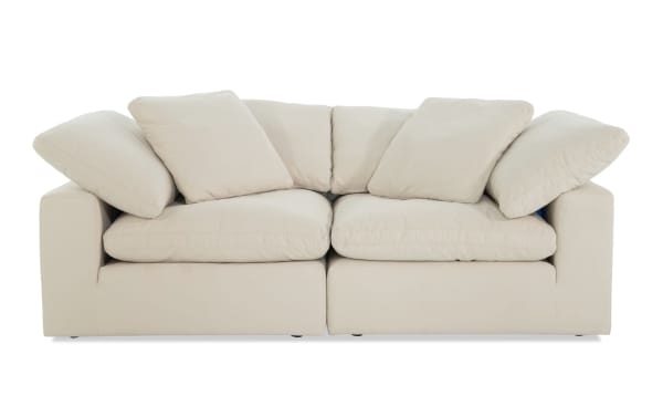 Dream Shell 88'' beige 2-piece modular loveseat with oversized reversible cushions, feather blend topper, polyester-nylon fabric, transitional style.