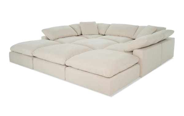 Dream Shell 131'' 9 Piece Beige Modular Sectional with 4 Ottomans, 3 Armless Chairs, 2 Corners, polyester fabric, transitional style, reversible cushioned seating.