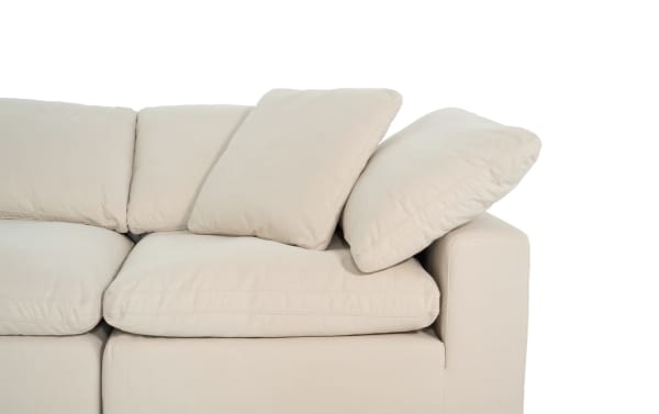 Beige Dream Shell 131'' 6 Piece Modular Sectional with plush polyester fabric, reversible oversized cushions, and transitional style.