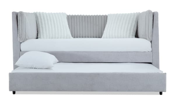 Sofia Full Gray Upholstered Daybed with Twin Trundle in glam style, featuring gray polyester fabric, channel tufted back cushions, and two faux fur pillows for luxury and comfort.