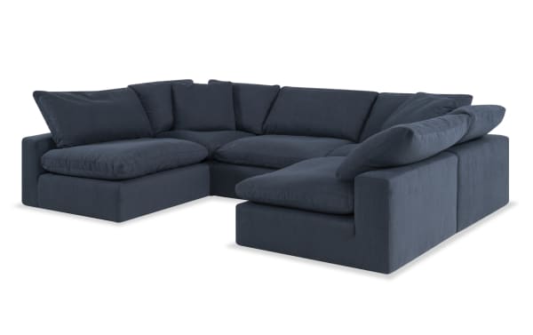 Dream Navy 183'' 5 Piece Modular Sectional in navy blue fabric with oversized reversible cushions, transitional style, polyester-nylon blend upholstery.