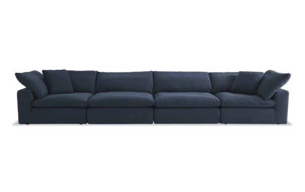 Dream Navy 174'' 4-piece modular sofa in navy blue fabric with 2 corners and 2 armless chairs. Transitional style, polyester-nylon upholstery.