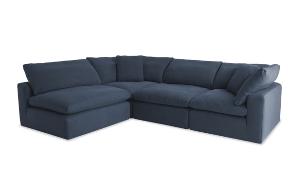 Dream Navy 174'' 4 Piece Modular Sofa in navy blue fabric with two corners, two armless chairs, reversible cushions, feather blend topper, transitional style.