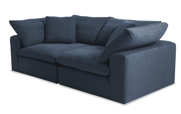 Dream Navy 88'' 2 Piece Modular Loveseat with 2 Corners in navy blue polyester fabric, transitional style, reversible oversized cushions with feather blend topper.