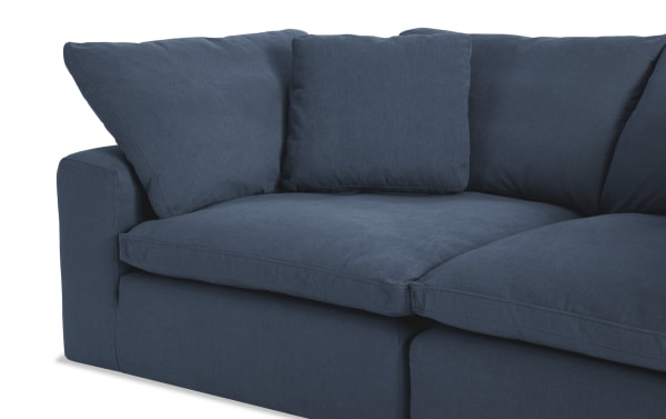 Dream Navy 88'' 2 Piece Modular Loveseat with 2 Corners in blue polyester fabric, transitional style, featuring oversized reversible cushions and accent pillows.