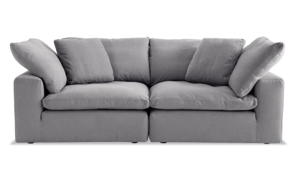 Dream Gray 88'' 2 Piece Modular Loveseat with 2 Corners in gray polyester fabric, transitional style, reversible oversized cushions, and accent pillows.