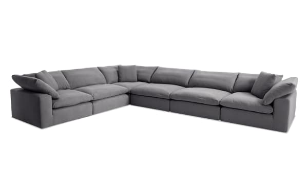 Dream Gray 174'' 6-piece modular sectional in gray fabric with 3 armless chairs, 3 corners, oversized reversible cushions, and feather blend toppers.