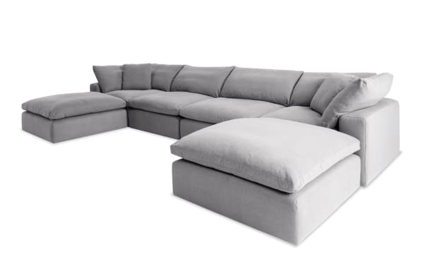 Dream Gray 174" 6 Piece Modular Sectional in gray polyester fabric with two armless chairs, corners, ottomans, and reversible Bob-O-Pedic cushions.