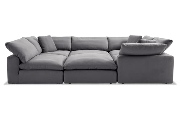 Dream Gray 131'' 6 Piece Modular Sectional in gray fabric with 3 corners, 2 armless chairs, 1 ottoman, and reversible Bob-O-Pedic cushions.