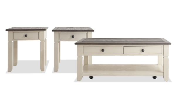 Laurel White & Brown Storage Coffee & 2 End Table Set in cottage style, featuring MDF, rubberwood, acacia veneers, distressed two-tone finish, dark hardware, storage drawers, bottom shelf, and casters for easy mobility.
