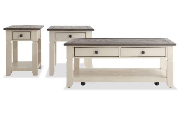 Laurel White & Brown Storage Coffee with End & Chairside Table Set in cottage style, featuring two-tone MDF, rubberwood, acacia veneer, distressed tops, dark hardware, storage drawers, bottom shelves, and casters for mobility.