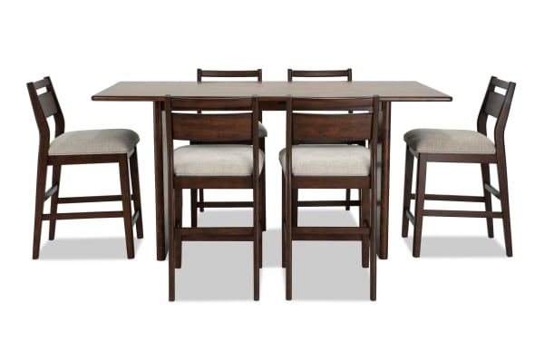 Mango 7 Piece Brown & Beige Solid Mango Wood Counter Height Dining Set with six beige polyester-upholstered Bob-O-Pedic stools, mid-century modern style.