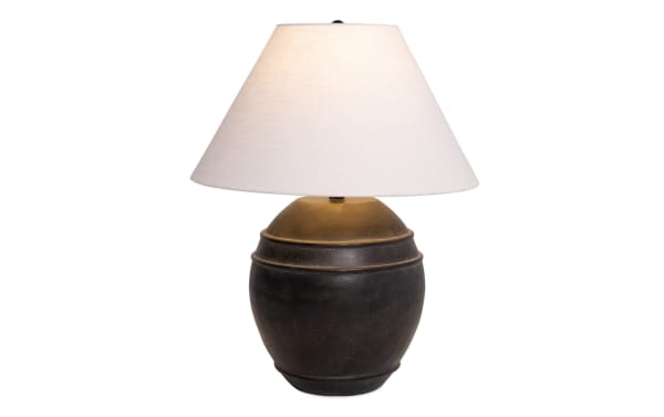Transitional Laurel Charcoal table lamp with round dark gray ceramic base and white fabric shade, ideal for bedside or accent lighting.